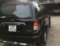 Ford Escape 3.0 V6 2003 - Cần bán Ford Escape 3.0 V6 đời 2003, màu đen