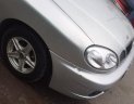Daewoo Lanos SX 2005 - Cần bán Daewoo Lanos SX năm sản xuất 2005, màu bạc xe gia đình
