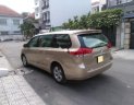 Toyota Sienna 2.7LE 2011 - Bán Toyota Sienna 2.7LE năm 2011, màu vàng, xe nhập