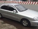 Daewoo Lanos SX 2005 - Cần bán Daewoo Lanos SX năm sản xuất 2005, màu bạc xe gia đình