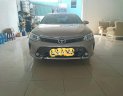 Toyota Camry 2.0 E 2016 - Bán ô tô Toyota Camry 2.0 E 2016, màu vàng cát