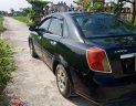 Daewoo Lacetti 2009 - Cần bán xe Daewoo Lacetti 2009, màu đen