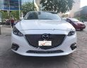 Mazda 3 1.5AT 2015 - Bán xe Mazda 3 1.5AT 2015, màu trắng số tự động, giá 620tr