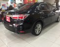 Toyota Corolla altis 1.8MT 2015 - Bán ô tô Toyota Corolla altis 1.8MT đời 2015, màu đen, 610 triệu