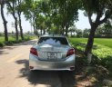 Toyota Vios 1.5 E 2014 - Bán ô tô Toyota Vios 1.5 E năm sản xuất 2014, màu bạc