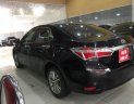 Toyota Corolla altis 1.8MT 2015 - Bán ô tô Toyota Corolla altis 1.8MT đời 2015, màu đen, 610 triệu