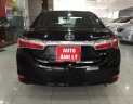 Toyota Corolla altis 1.8MT 2015 - Bán ô tô Toyota Corolla altis 1.8MT đời 2015, màu đen, 610 triệu