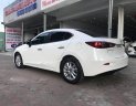 Mazda 3 1.5AT 2015 - Bán xe Mazda 3 1.5AT 2015, màu trắng số tự động, giá 620tr