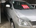 Toyota Innova E 2013 - Bán Toyota Innova E đời 2013, màu bạc 