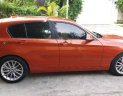 BMW 1 Series 116i  2013 - Bán BMW 1 Series 116i đời 2013, xe nhập, màu cam