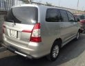 Toyota Innova 2013 - Cần bán gấp Toyota Innova năm sản xuất 2013, màu bạc