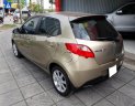 Mazda 2 1.4 2015 - Bán Mazda 2 1.4 đời 2015, màu vàng chính chủ