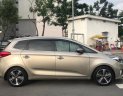 Kia Rondo GAT 2017 - Bán Kia Rondo 2017 tự động, màu vàng cát, xe còn rất mới đi kỹ