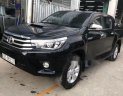 Toyota Hilux 2015 - Cần bán lại xe Toyota Hilux đời 2015, màu đen, giá tốt