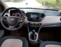 Hyundai Grand i10 2014 - Cần bán Hyundai Grand i10 sản xuất 2014, màu trắng, xe nhập