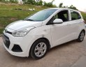 Hyundai Grand i10 2014 - Cần bán Hyundai Grand i10 sản xuất 2014, màu trắng, xe nhập