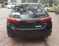 Toyota Corolla altis 1.8G 2016 - Bán Toyota Corolla Altis 1.8G đời 2016, màu đen số tự động, giá chỉ 689 triệu