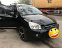 Kia Carens 2011 - Cần bán Kia Carens 2011, màu đen số sàn, 279tr