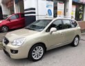 Kia Carens SXAT 2011 - Bán Kia Carens SXAT 2011, màu vàng