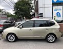 Kia Carens SXAT 2011 - Bán Kia Carens SXAT 2011, màu vàng