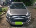 Toyota Innova 2.0E MT 2017 - Bán Toyotaa Innova 2.0E MT năm sản xuất 2017, màu nâu