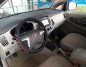 Toyota Innova E 2015 - Bán ô tô Toyota Innova E, số sàn, đăng ký lần đầu 2015, màu bạc, ít sử dụng, 610 triệu