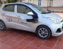 Hyundai Grand i10 2014 - Cần bán gấp Hyundai Grand i10 năm 2014, màu bạc, xe nhập chính chủ, 263 triệu