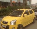 Kia Morning 2011 - Cần bán lại xe Kia Morning sản xuất năm 2011, màu vàng 