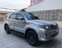 Toyota Fortuner 2.7V 4x4 AT 2015 - Bán Toyota Fortuner 2.7V 4x4 AT sản xuất năm 2015, màu bạc xe gia đình, giá 800tr