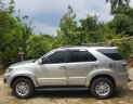 Toyota Fortuner V 2014 - Bán Toyota Fortuner (V) sàn xuất 2014, màu bạc, gia đình sử dụng kỹ zin 98%