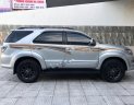 Toyota Fortuner 2.7V 4x4 AT 2015 - Bán Toyota Fortuner 2.7V 4x4 AT sản xuất năm 2015, màu bạc xe gia đình, giá 800tr