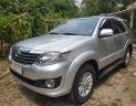 Toyota Fortuner V 2014 - Bán Toyota Fortuner (V) sàn xuất 2014, màu bạc, gia đình sử dụng kỹ zin 98%