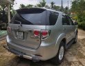 Toyota Fortuner V 2014 - Bán Toyota Fortuner (V) sàn xuất 2014, màu bạc, gia đình sử dụng kỹ zin 98%