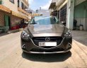 Mazda 2    2016 - Cần bán xe Mazda 2 năm 2016, màu nâu xe gia đình, giá chỉ 500 triệu