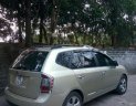 Kia Carens EX 2.0 MT 2009 - Bán Kia Carens EX 2.0 MT đời 2009, màu vàng chính chủ