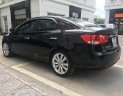 Kia Cerato 1.6 AT 2010 - Cần bán Kia Cerato 1.6 AT đời 2010, màu đen, nhập khẩu, 440 triệu