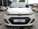 Hyundai Grand i10  1.2 AT 2016 - Cần bán lại xe Hyundai Grand i10 1.2 AT đời 2016, màu trắng, xe nhập