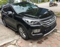 Hyundai Santa Fe 2.2L 4WD 2016 - Cần bán Hyundai Santa Fe 2.2L 4WD năm 2016, màu đen, giá tốt