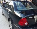 Ford Laser GHIA 1.8 MT 2003 - Bán Ford Laser GHIA 1.8 MT năm 2003, màu đen, giá 200tr