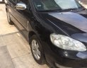 Toyota Corolla altis 1.8G MT 2004 - Bán Toyota Corolla altis 1.8G MT 2004, màu đen số sàn, 295tr