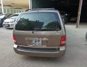 Kia Carnival 2009 - Cần bán Kia Carnival đời 2009, màu vàng