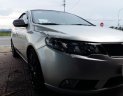 Kia Cerato 2011 - Cần bán Kia Cerato đời 2011, màu bạc, nhập khẩu nguyên chiếc số sàn