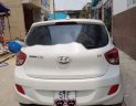 Hyundai Grand i10  1.2 AT 2015 - Cần bán Hyundai Grand i10 1.2 AT sản xuất năm 2015, màu trắng mới chạy 18.000 km giá cạnh tranh