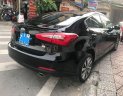 Kia K3 2014 - Bán Kia K3 sản xuất năm 2014, màu đen, giá 548tr