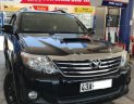 Toyota Fortuner 2014 - Bán ô tô Toyota Fortuner sản xuất năm 2014, màu đen chính chủ, giá tốt