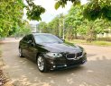 BMW 5 Series  520i 2014 - Cần bán lại xe BMW 5 Series 520i đời 2014, màu đen, giá tốt