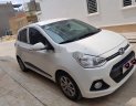 Hyundai Grand i10  1.2 AT 2015 - Cần bán Hyundai Grand i10 1.2 AT sản xuất năm 2015, màu trắng mới chạy 18.000 km giá cạnh tranh