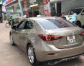 Mazda 3 2.0 AT 2015 - Bán Mazda 3 2.0 AT sản xuất năm 2015, màu vàng giá cạnh tranh