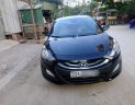 Hyundai i30 1.6 AT 2013 - Cần bán lại xe Hyundai i30 sản xuất 2013, màu đen, xe nhập, 525tr