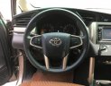 Toyota Innova 2.0E 2017 - Cần bán xe Toyota Innova 2.0E năm sản xuất 2017, màu xám, giá chỉ 719 triệu